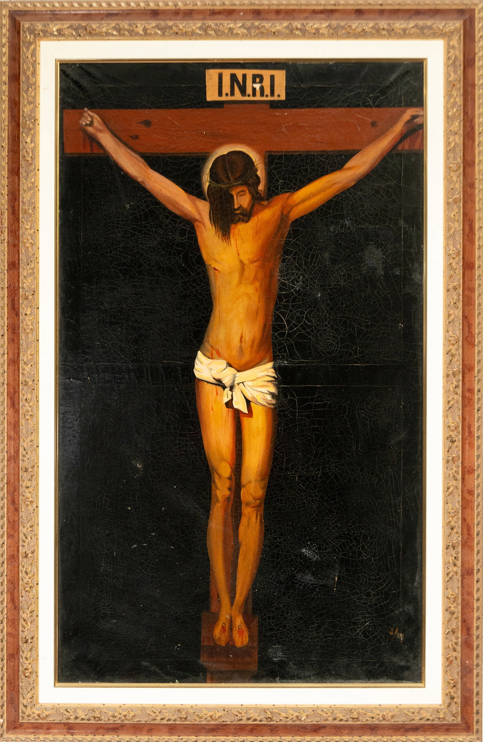 Christ crucified, Spanish School, 19th Century: Oil on canvas. Dimensions: 100 x 65 cm; 128 x 85 cm. Christ crucified against a dark background, with the figure of Jesus nailed to the cross beneath the inscription INRI, head bowed, wearing a crown 