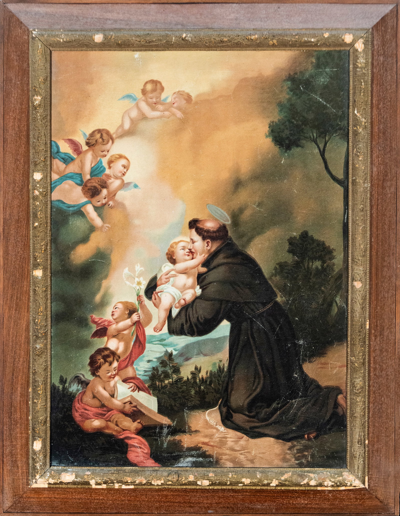 Saint Anthony with the Child, Spanish School, 19th Century: Oil on canvas. Dimensions: 71 x 51 cm; 89 x 69 cm. Devotional scene of Saint Anthony kneeling and embracing the Christ Child, surrounded by cherubs amidst clouds and an idealized landscape. The compos