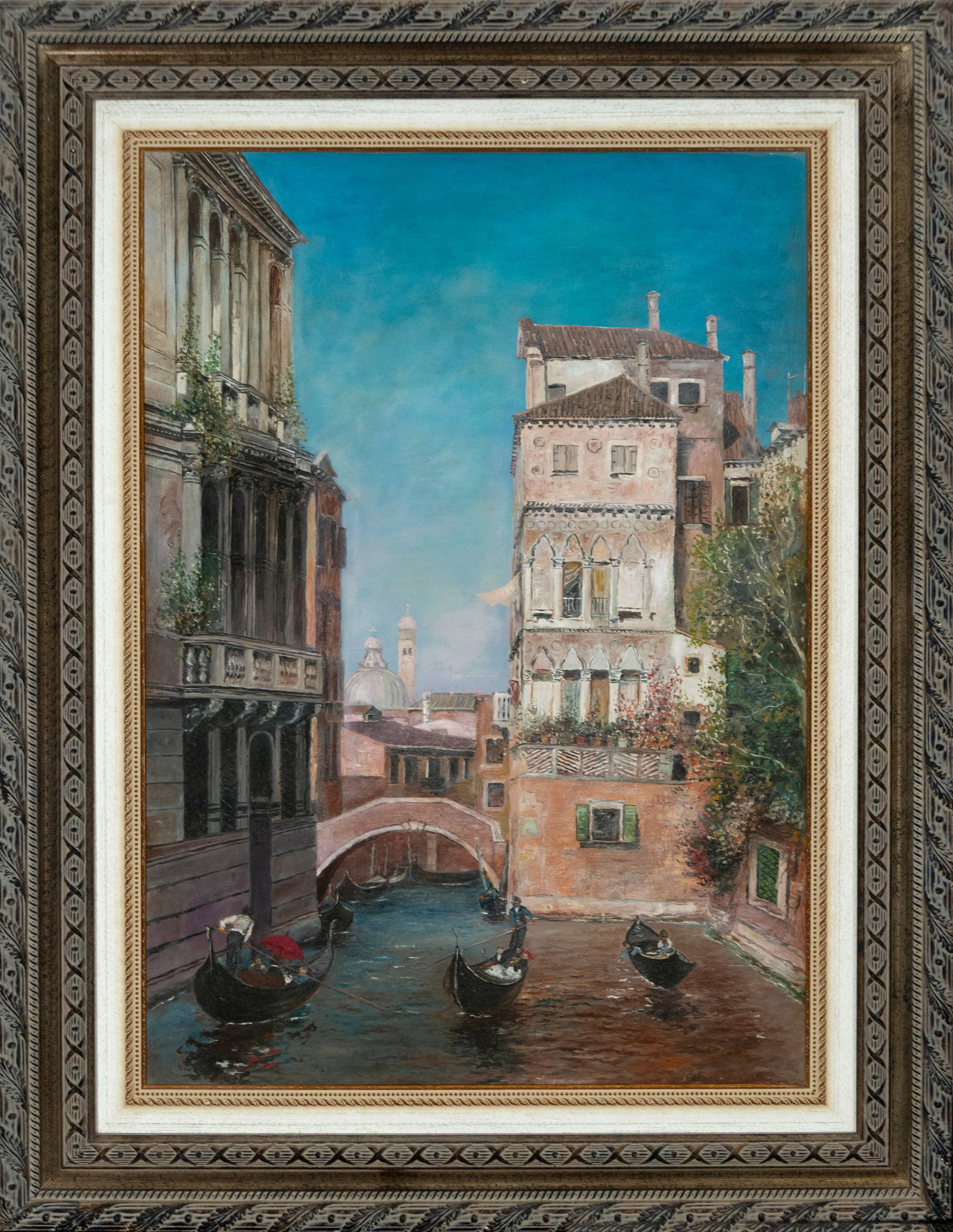 View of a canal in Venice. Signed R. Diez, European School, 20th Century: Oil on panel. Dimensions: 72 x 57 cm; 91 x 71 cm. Venetian cityscape with a canal traversed by gondolas and flanked by historic buildings in delicate shades of pink and ochre. The composition draws th
