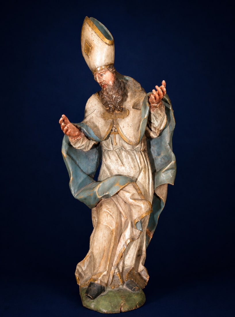 Large Italian Saint Augustine of the 17th Century: Carved and polychromed wood. Dimensions: 92 x 40 x 28 cm. Sculpture of Saint Augustine depicted in episcopal vestments and an ornate mitre, displaying a dynamic composition with a pronounced Baroque m