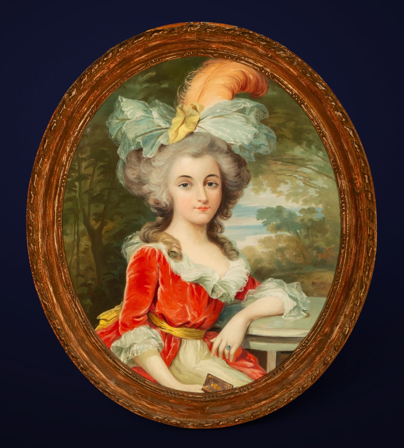 Portrait of a lady with a feathered hat, Signed and dated, European School, early 20th century.: Oil on canvas. Dimensions: 60 x 50 cm; frame: 70 x 60 cm. Half-length portrait of a woman in an oval format, seated against a landscape background. The lady wears a red dress with a light-colored coll