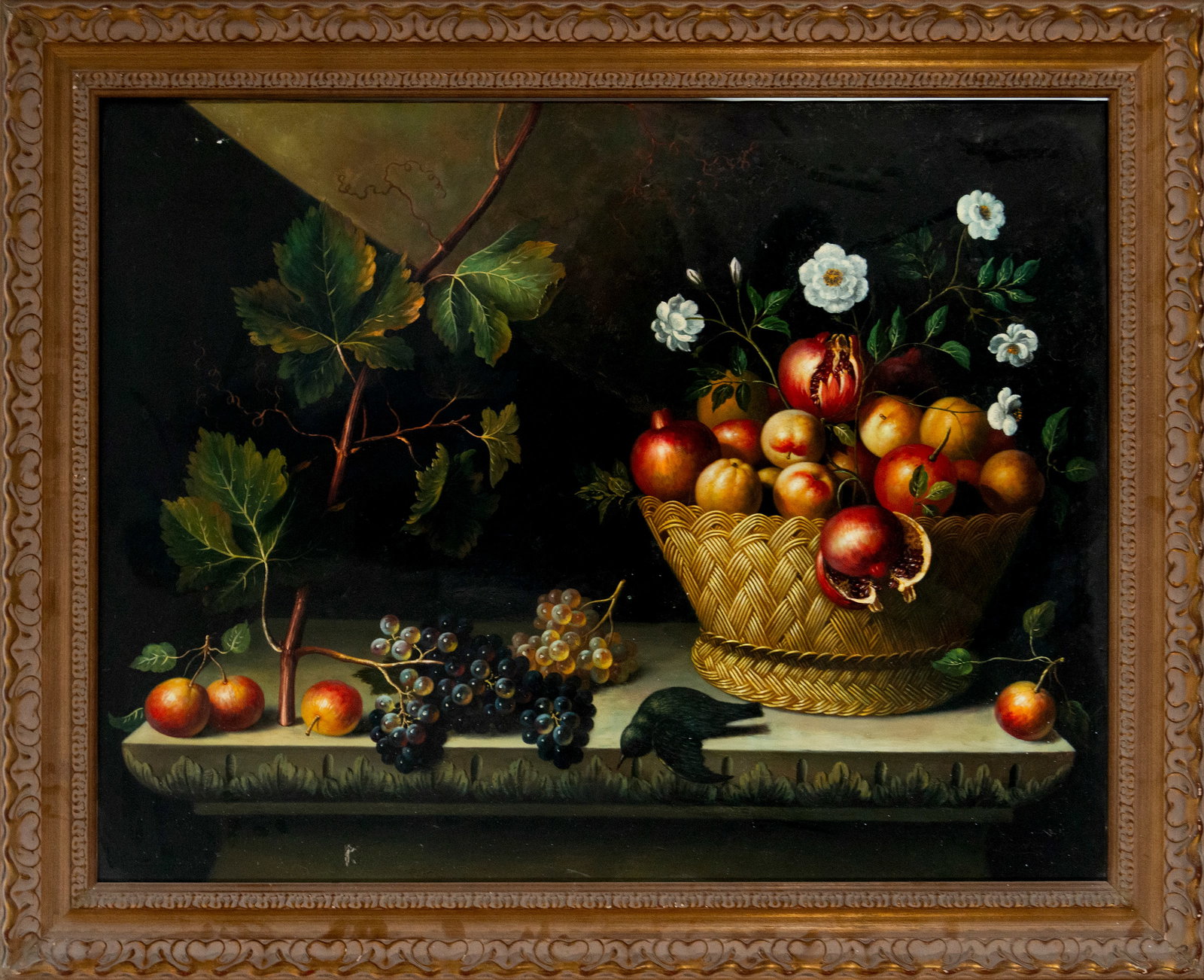 Still life with fruit and flowers. Spanish School. 18th century: Oil on canvas. Dimensions: 116 x 90 cm (light) / 136 x 111 cm (framed). A still life of great compositional force, it presents a woven basket overflowing with pomegranates, apples, and peaches, accomp