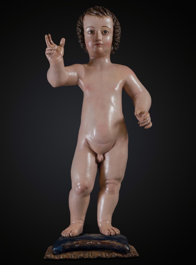 Enfantt Jesus Salvator Mundi, follower of Juan Martínez Montañes, 17th century Spanish school: In polychrome wood, measures: 76 x 35 x 21 cm total