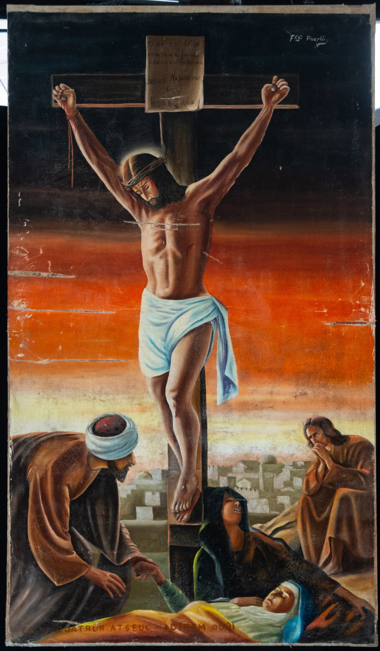 Christ crucified with mourners. Signed Fco Puerto, Spanish school, 20th century: Oil on canvas. Dimensions 138 x 80 cm. Scene of Calvary with Christ nailed to the cross, his head bowed and his body silhouetted against an intensely reddened sky. At his feet are several grieving fig