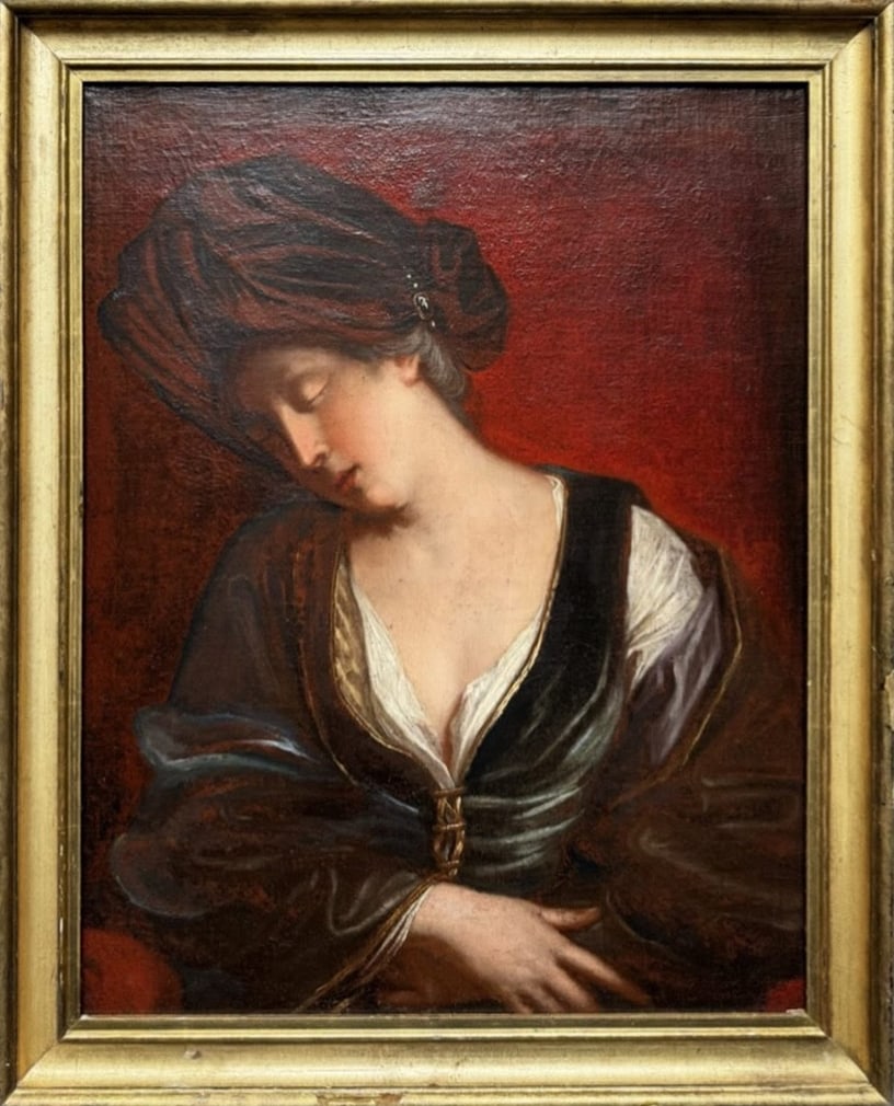 Circle of JEAN-BAPTISTE SANTERRE (1651-1717) - Sleeping young woman with turban: Oil on relined canvas. Dimensions: 82 x 66 cm (with frame). This early 18th-century French painting depicts a young woman asleep, shown from the waist up, silhouetted against a deep red background tha
