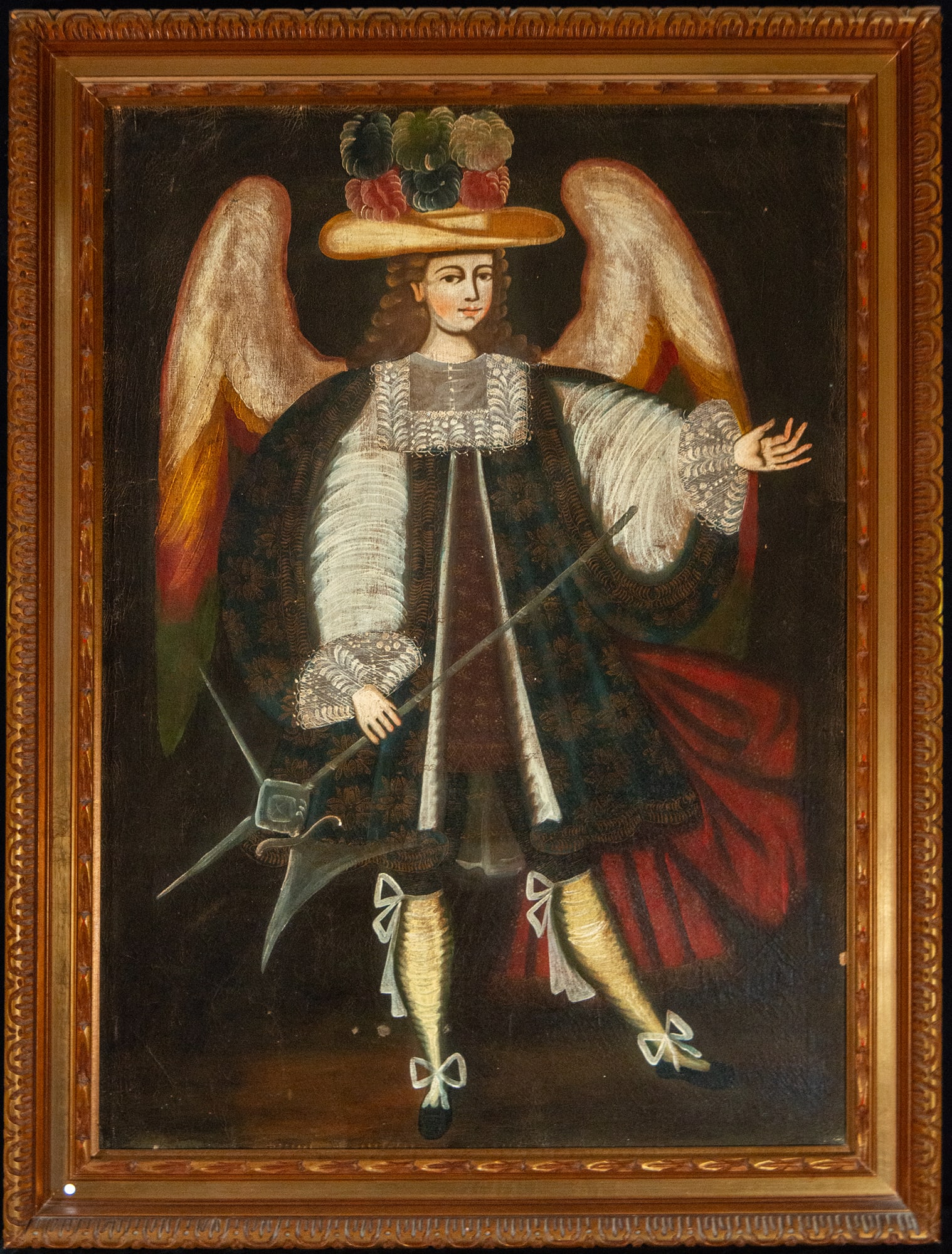 Archangel from Cuzco with halberd, Hispanic American colonial school, 18th century: Oil on canvas. Dimensions 108 x 78 cm; framed 125 x 95 cm. Full-length winged figure depicted frontally against a dark background, wearing a wide-brimmed hat adorned with feathers, an embroidered coat