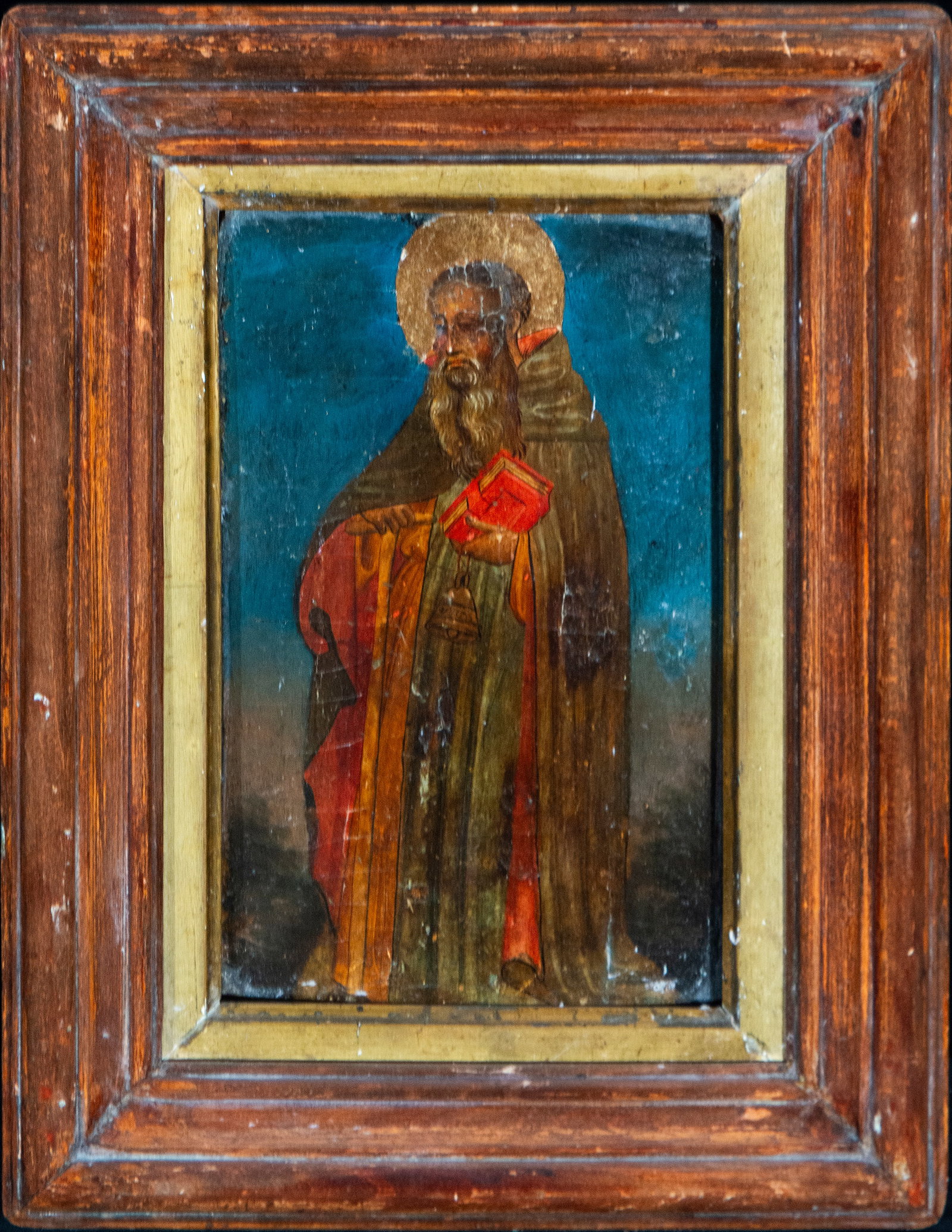 Saint Anthony Abbot. Italian School, 16th Century.: Oil on panel. Dimensions: 29 cm x 18 cm and 42 cm x 31 cm (framed). Full-length depiction of Saint Anthony Abbot, frontally oriented and characterized by his monastic habit and long beard, which reinf