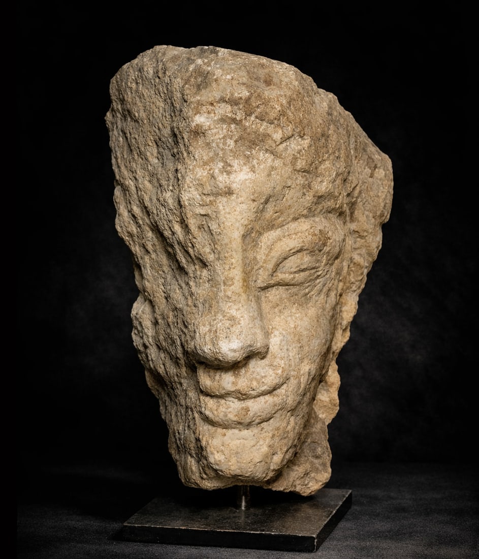 Ancient stone head, 15th century (1 of 2)