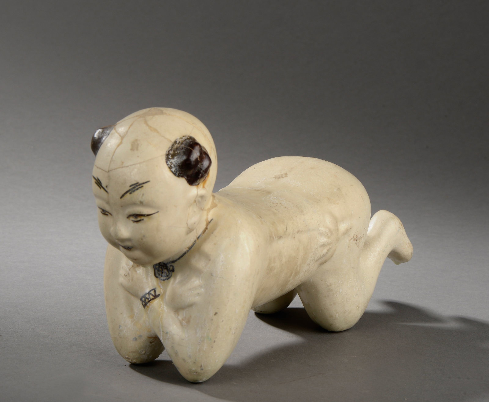 Chinese Cizhu headrest with Ho-Ho child (1 of 1)