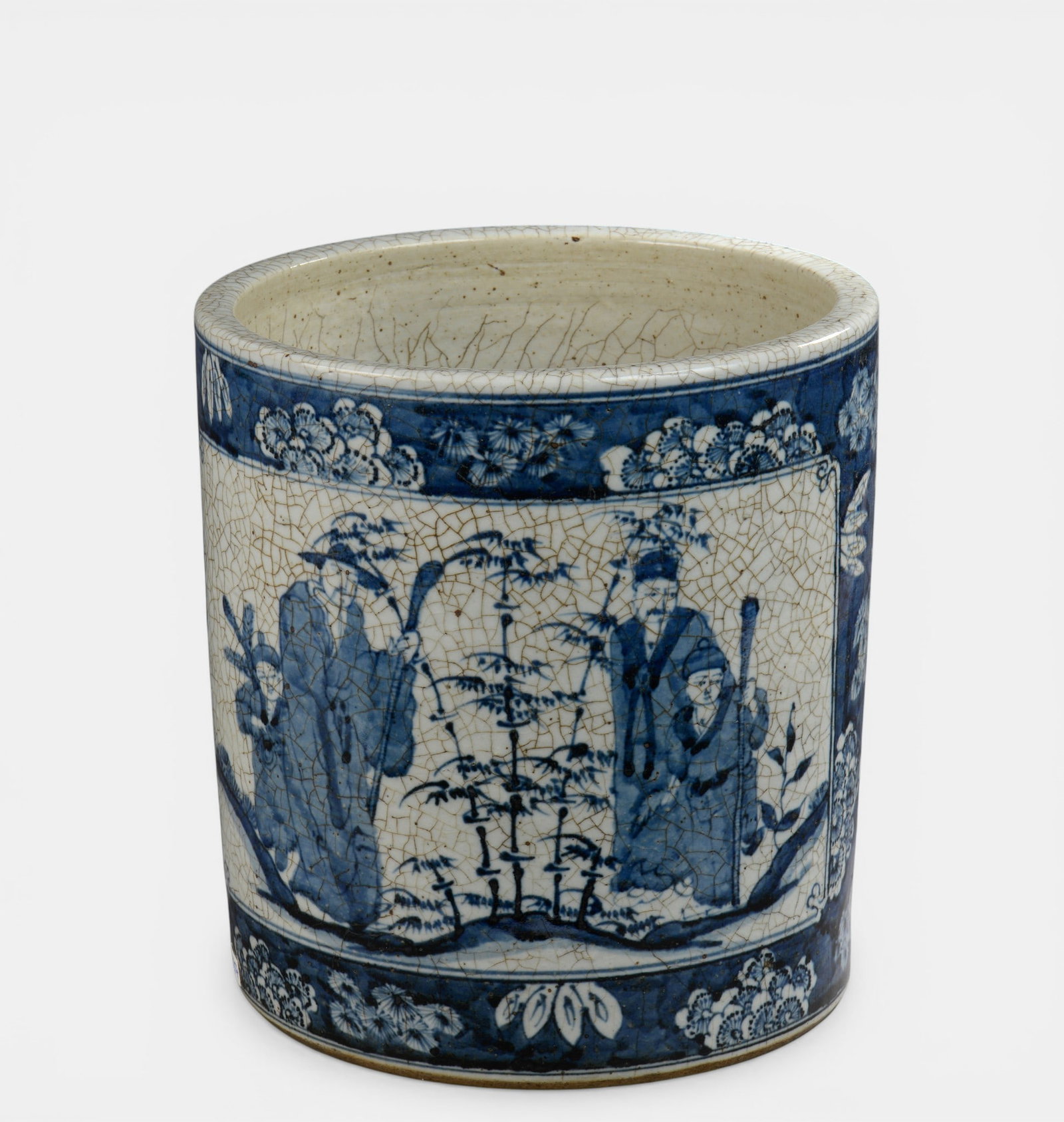 Cylindrical brush holder in white and blue porcelain with characters and floral friezes (1 of 3)