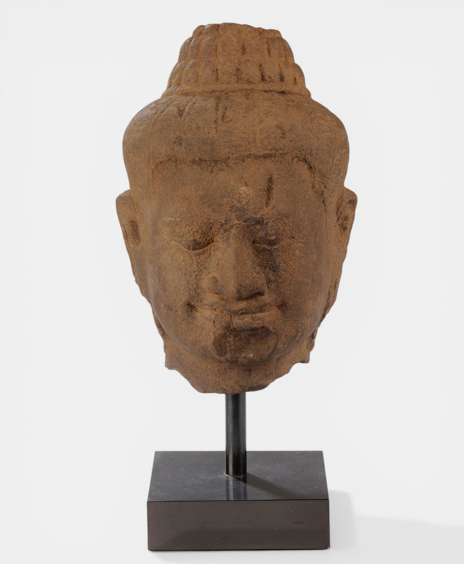 Head of Vishnu with serene expression wearing a conical tiara (1 of 1)
