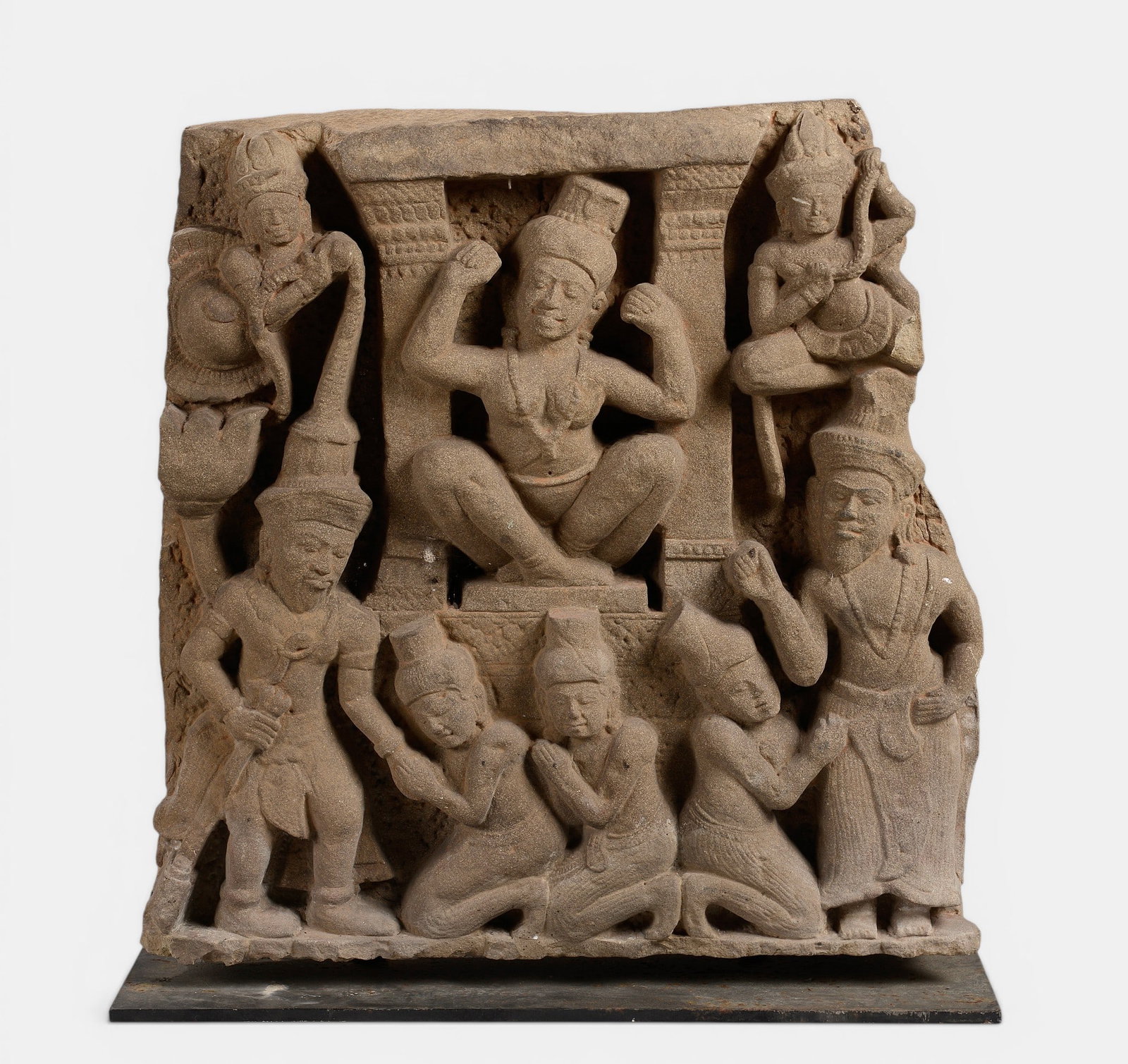 Frieze of a sanctuary depicting the departure of Prince Siddhartha Gautama into the ascetic life: The scene is arranged in two registers. In the upper register appears the mother of Prince Siddhartha, Queen Maya, surrounded by two celestial gandharvas, one of them holding the prince's long hair to