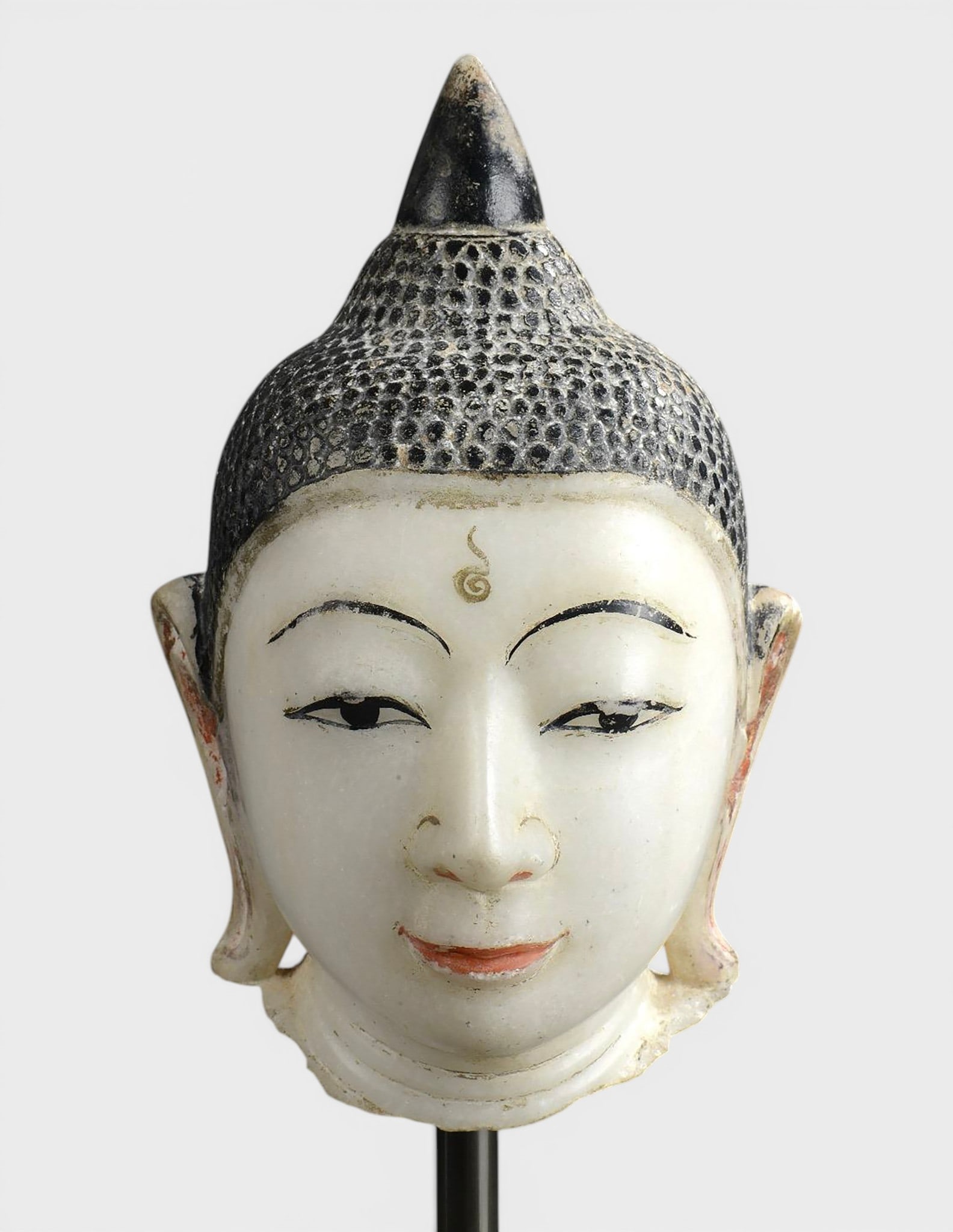 Buddha's head marked by the urn in the center of the forehead (1 of 3)