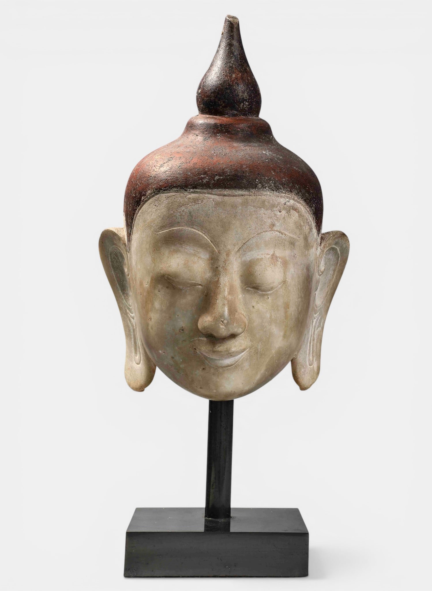 Buddha head of youthful beauty and serene expression with ushnisha and rasmi (1 of 5)