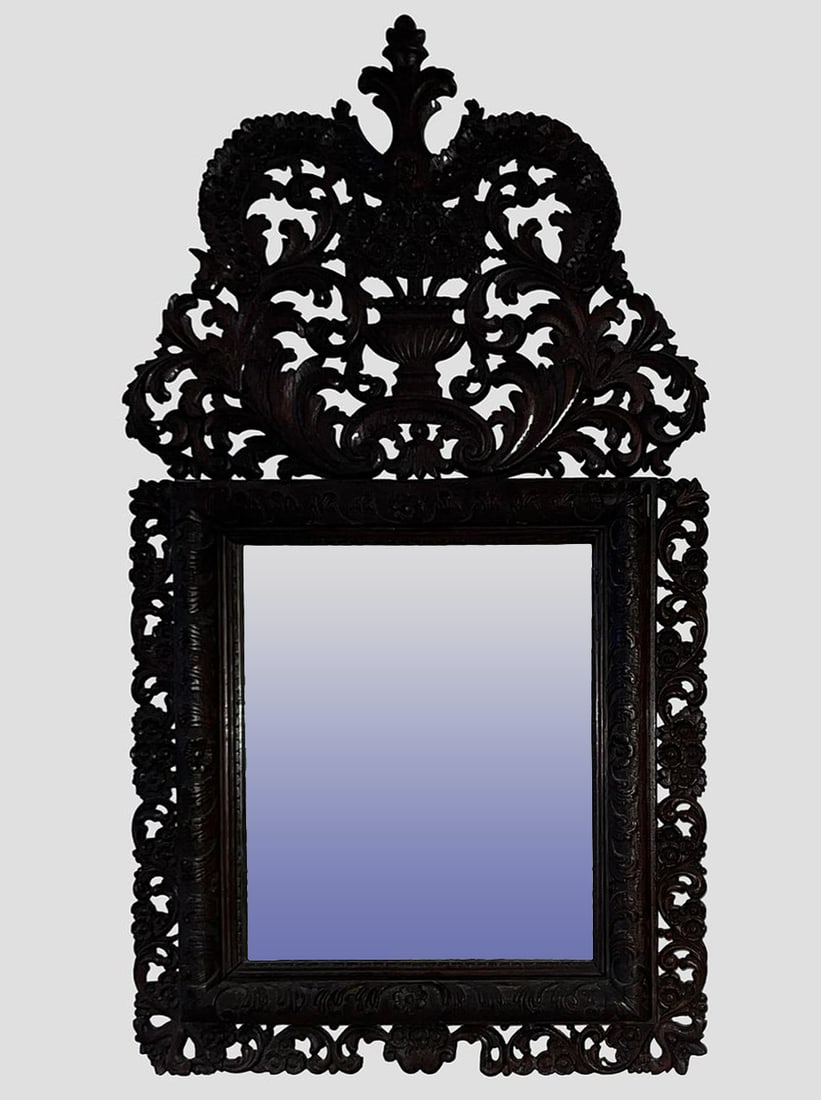 Napoleon III mirror in carved wood with a frame surrounded by scrolls and topped by a floral cup (1 of 4)