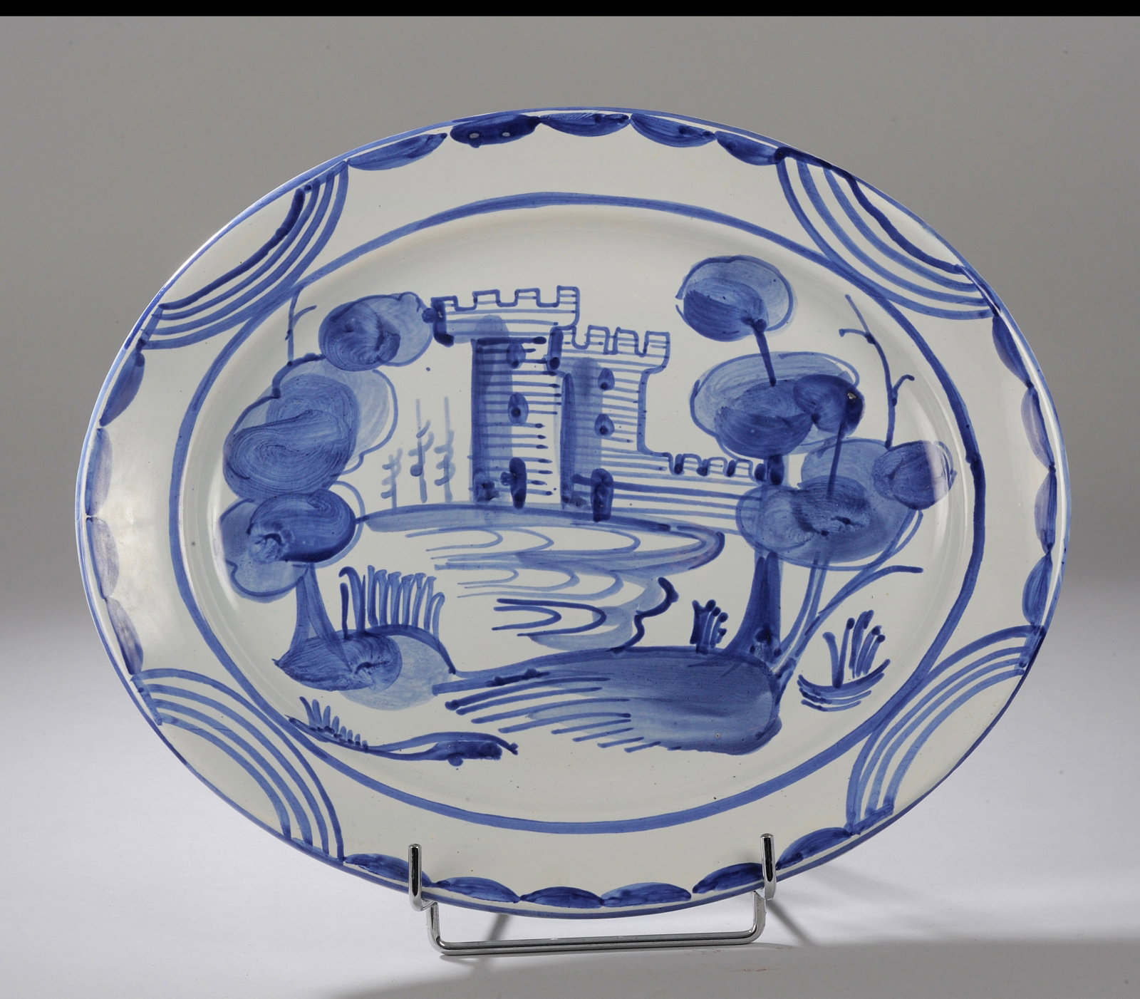 Earthenware plate with blue decoration (1 of 1)