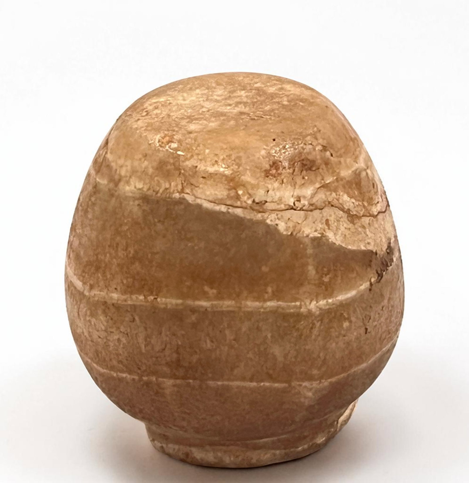 Monolithic alabaster vase with a slightly ovoid globular shape (1 of 2)