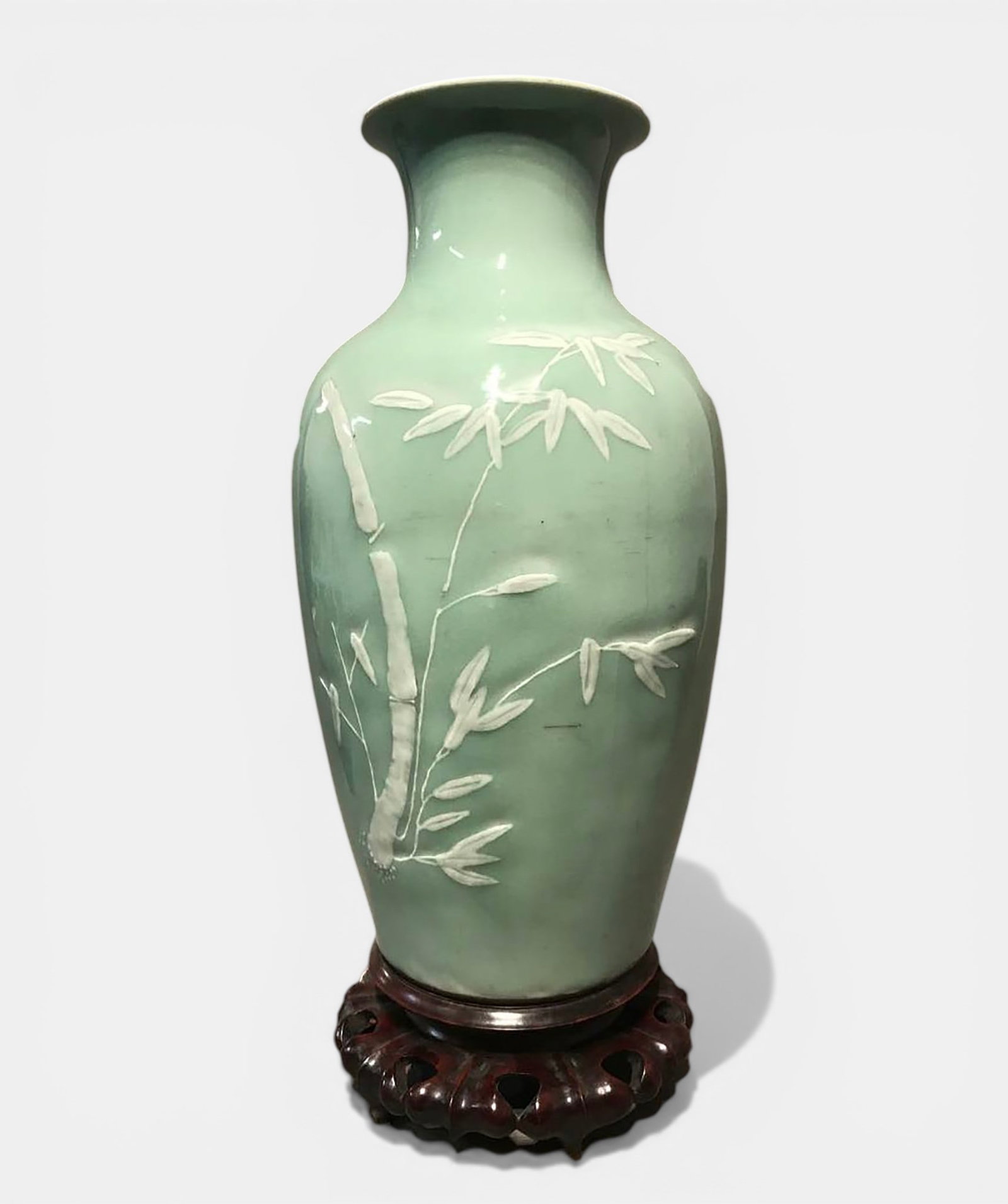 Porcelain baluster vase with white relief of prunus and bamboo branches on celadon (1 of 5)