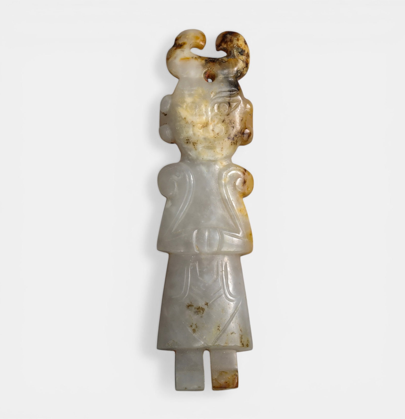 Anthropomorphic ornament in two-tone jade with standing figure and bifurcated horn-shaped headdress (1 of 6)