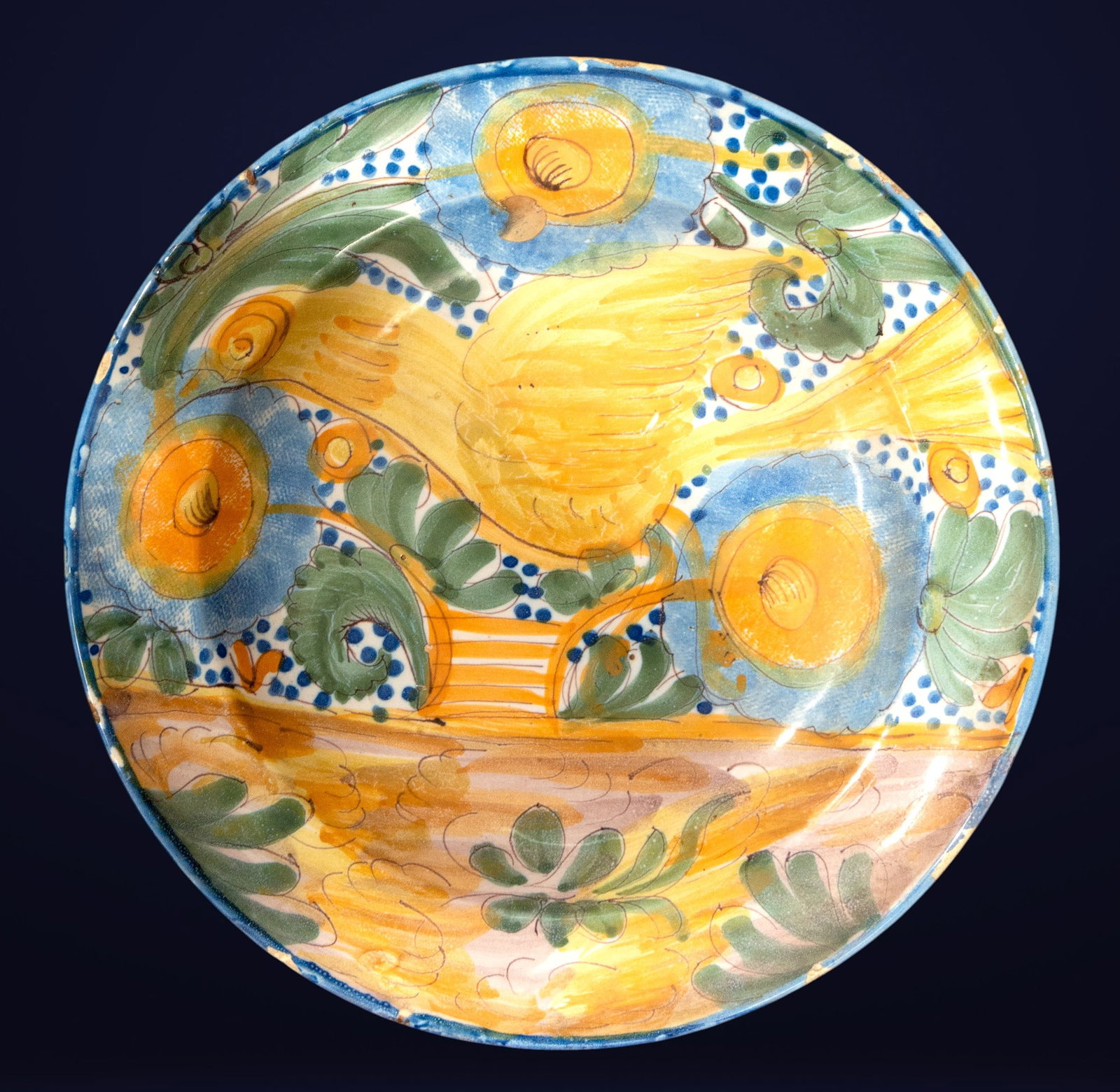 Ceramic plate by Ribas Alves. Spanish School. 19th century.: Glazed and polychrome ceramic. Dimensions: 30 x 30 x 3 cm. Plate from the Ribas Alves workshop, made in the 19th century with vibrant polychrome decoration. The surface features a bird in flight among