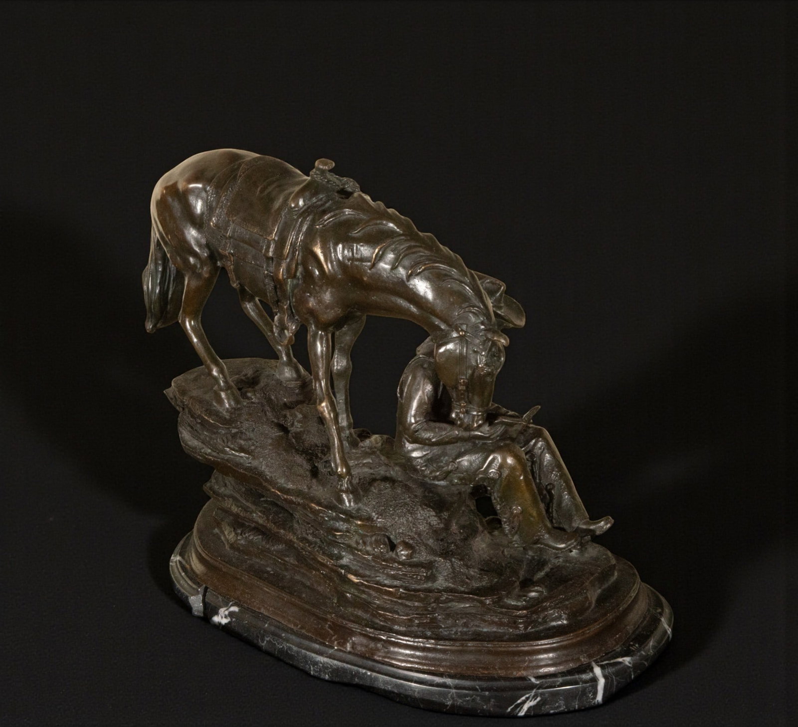 Equestrian scene with figure. Signed - European School. 19th-20th century: Cast and patinated bronze. Measures 27 x 35 x 16 cm.