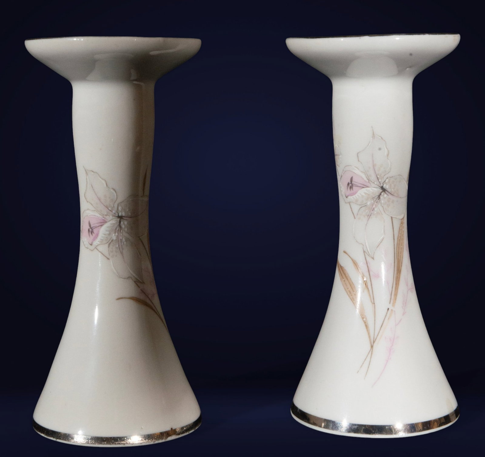 Pair of porcelain candlesticks with lilies, European school, 20th century. (1 of 1)