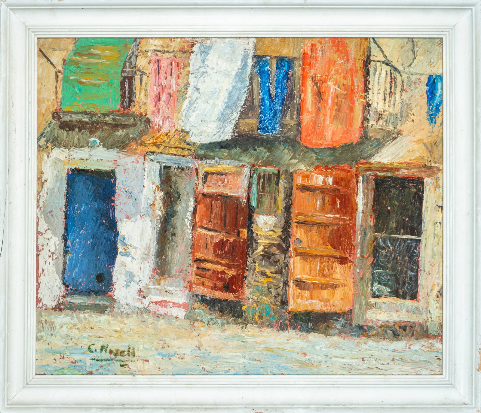 C. Nonell. Spanish School. 20th Century.: Oil on panel. Dimensions: 55 x 44 cm. Urban composition with colorful facades, open doors and balconies, executed with thick paint and powerful expressiveness. The impasto brushstrokes and chromatic c