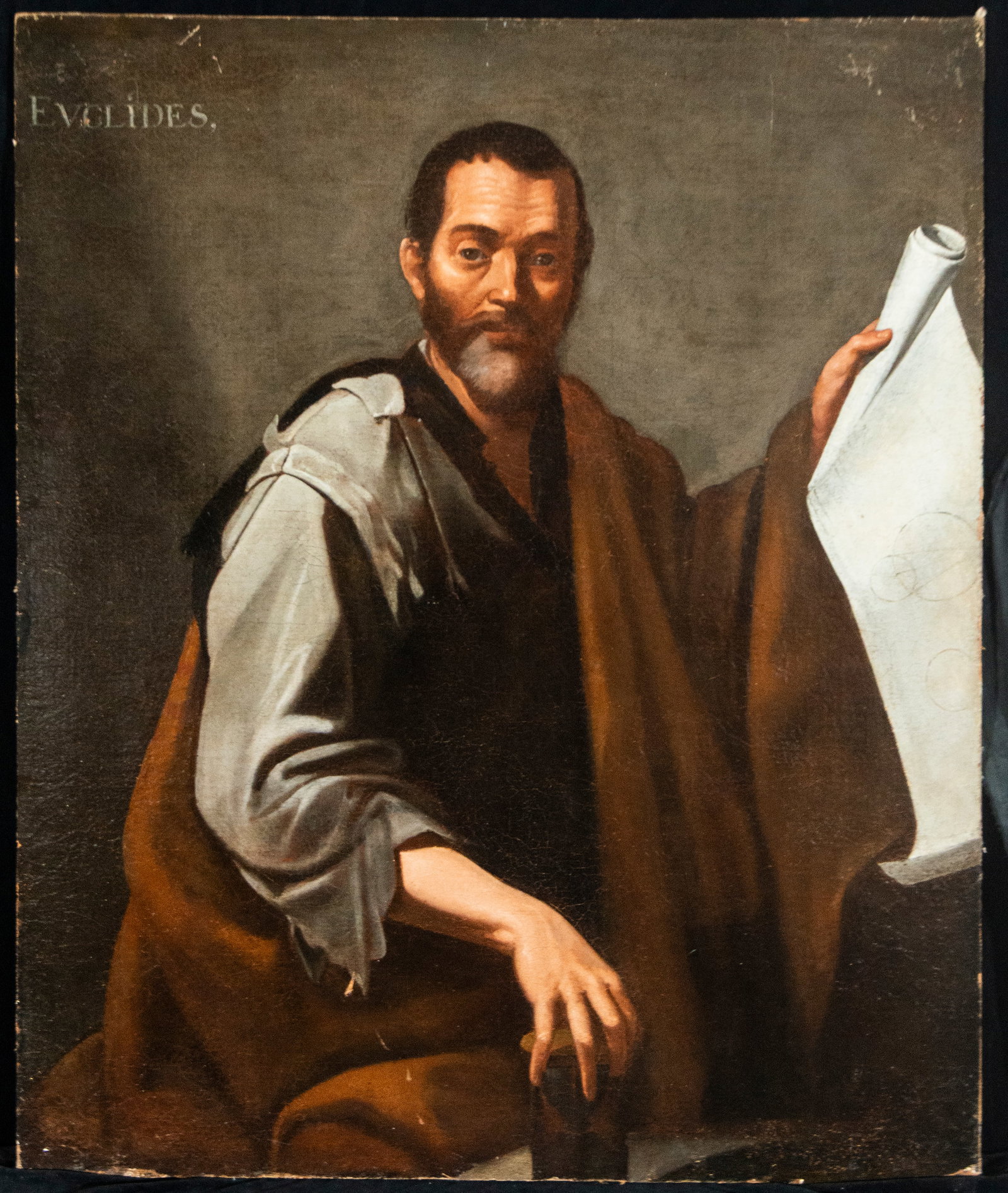 STAR LOT - EUCLID - JOSEPH OF RIBERA OR HIS WORKSHOP - 17TH CENTURY NEAPOLITAN SCHOOL: Oil on canvas. Dimensions 110 x 91 cm. Early half-length portrait of the celebrated mathematician and geometer Euclid, identified by an inscription in the upper left corner and accompanied by a large 