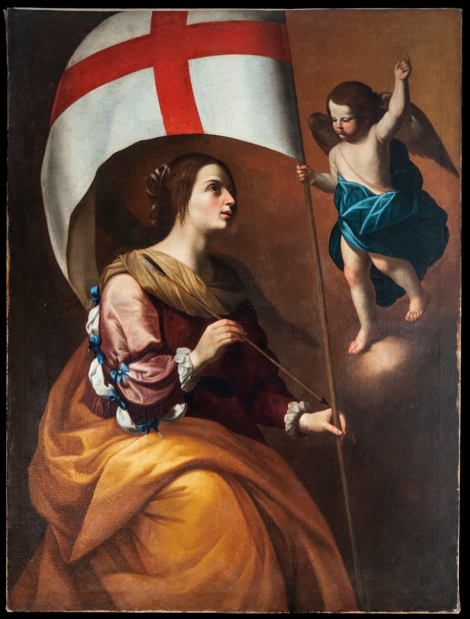 Saint Ursula - ROMAN OR NEAPOLITAN MASTER - 17th Century: Oil on canvas. Dimensions 174 x 135 cm. The composition depicts a saint carrying a large white banner with a red cross, accompanied by an angel descending from the celestial realm, pointing upwards in