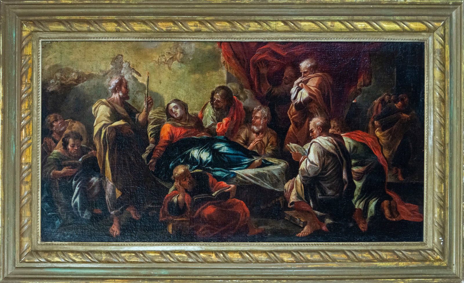 The Assumption of the Virgin, Spanish or Italian master, 17th century: Oil on canvas. Dimensions 111 x 58 / 136 x 83 cm. Scene of the Assumption of the Virgin surrounded by the apostles, gathered around her bier in a dense and theatrical composition of great emotional in
