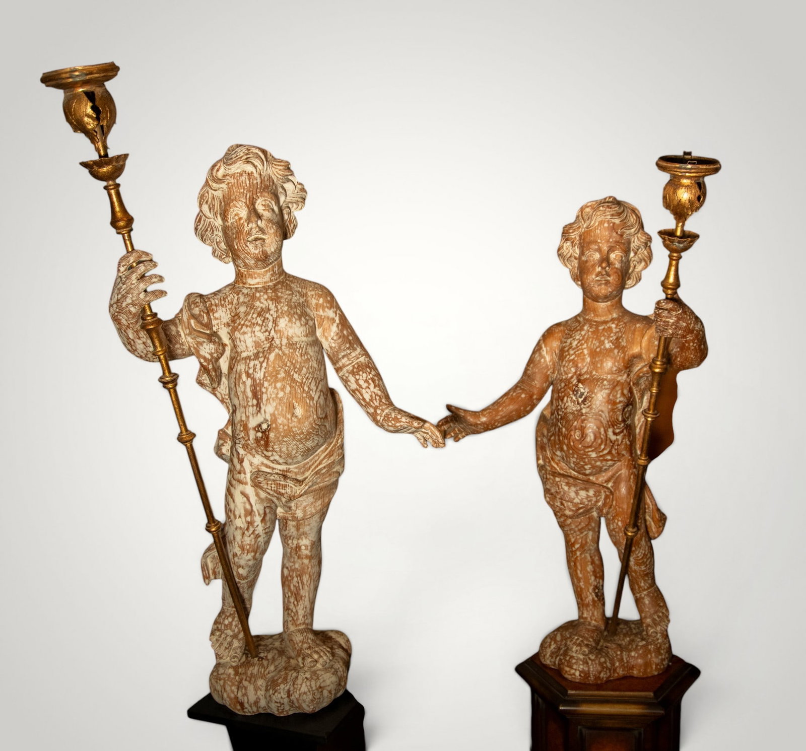 Large Pair of Torchbearing Angels in whitewashed wood, 19th century: Each one measures 96 x 24 cm, electrified