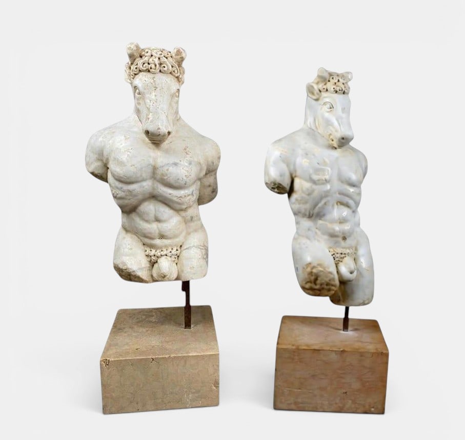 Pair of Minotaurs. Italian Baroque School. 17th Century: Carved beige and gray marble. Measures 102 cm high with base; 81 cm high without base. Pair of sculptures representing the Minotaur, the famous creature of Greek mythology characterized by the union o