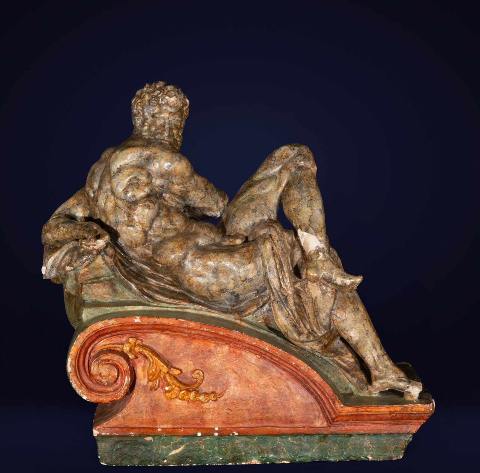 Reclining figure in classical style, European school, late 19th-early 20th century: Sculpture in plaster or stucco. Measures 64 x 59 x 25 cm.