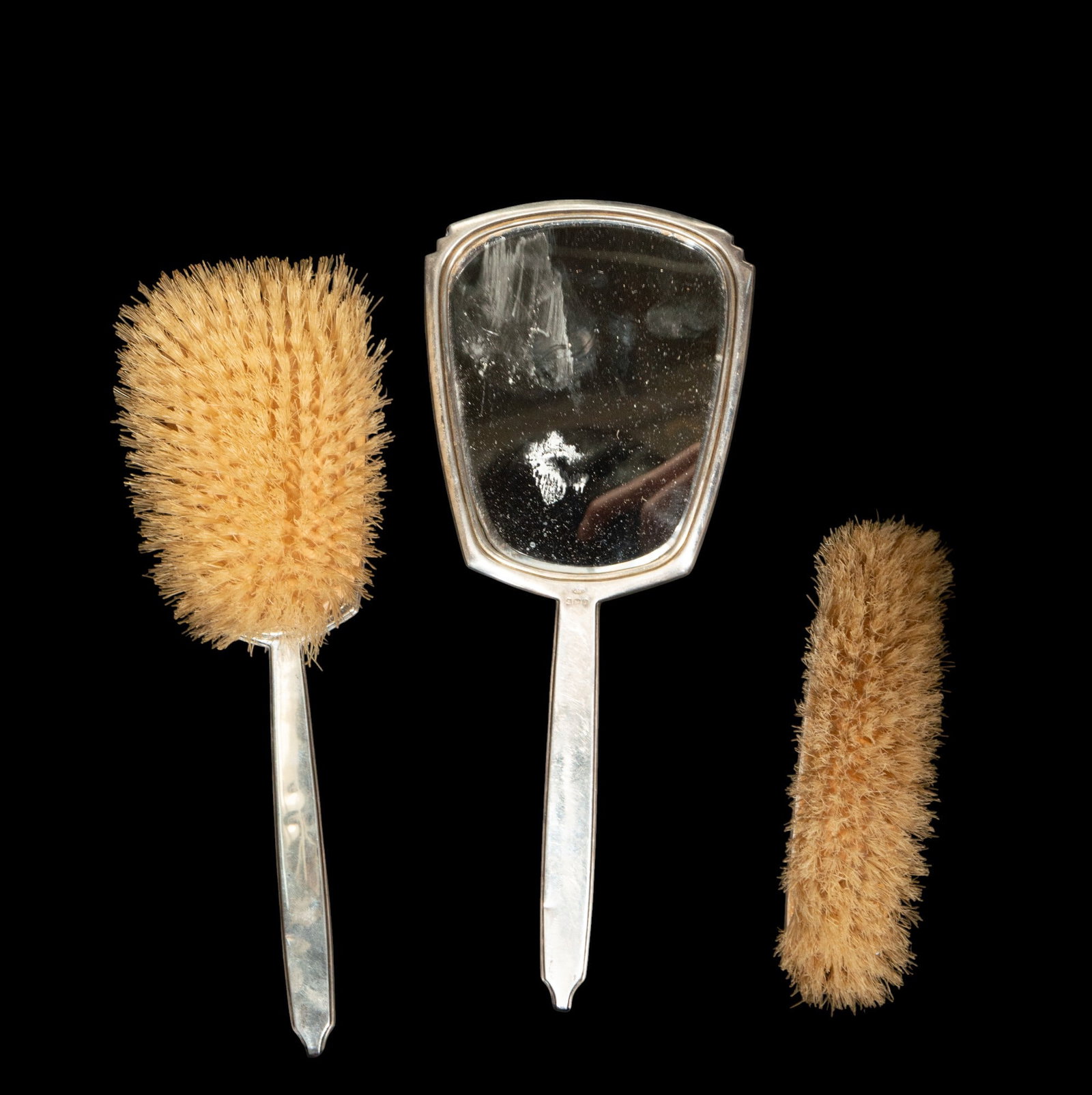 Silver and English guilloché enamel vanity set. Sheffield marks, early 1900s.: Art Deco silver and enamel. Dimensions: mirror 26 cm x 11 cm x 1 cm, large brush 24 cm x 10 cm x 4 cm, small brush 3 cm x 15 cm x 4 cm