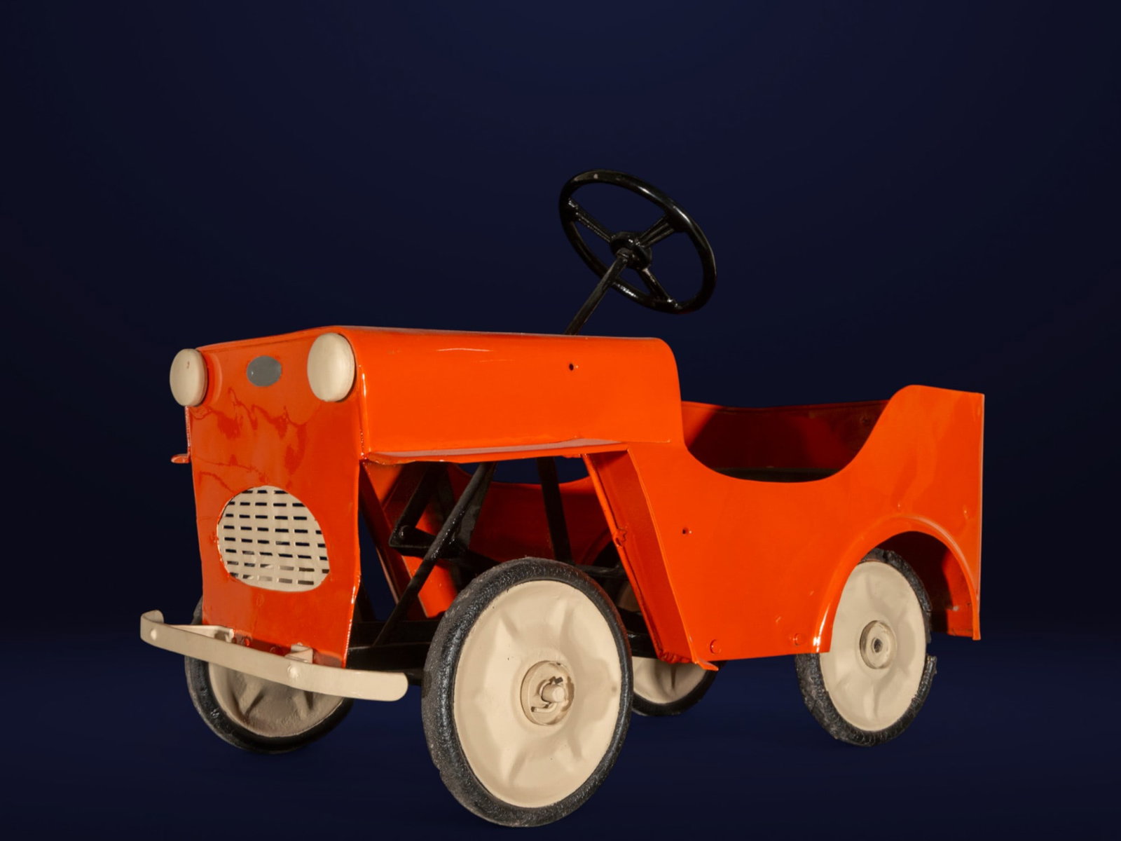 Restored 1930s brass pedal car (1 of 4)