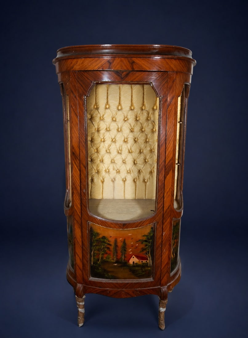 Polychrome display case, 19th century: Painted wooden display cabinet. Glass panels missing. Measures 175 x 83 x 45 cm. Features a curved body with panels decorated with painted landscapes and a central display area. An ornamental 20th-cen