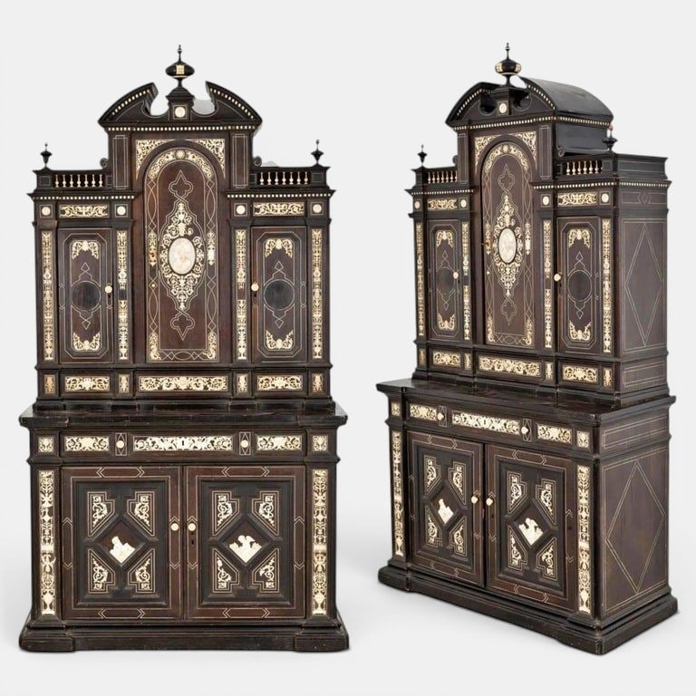 Two-section sideboard with ivory marquetry, attributed to Ferdinando Pogliani. Italian school. 19th: Ebonized wood with high-relief ivory inlays. Dimensions: 216 x 120 x 50 cm. This magnificent two-section sideboard is conceived as a miniature architectural masterpiece, characterized by a complex sym
