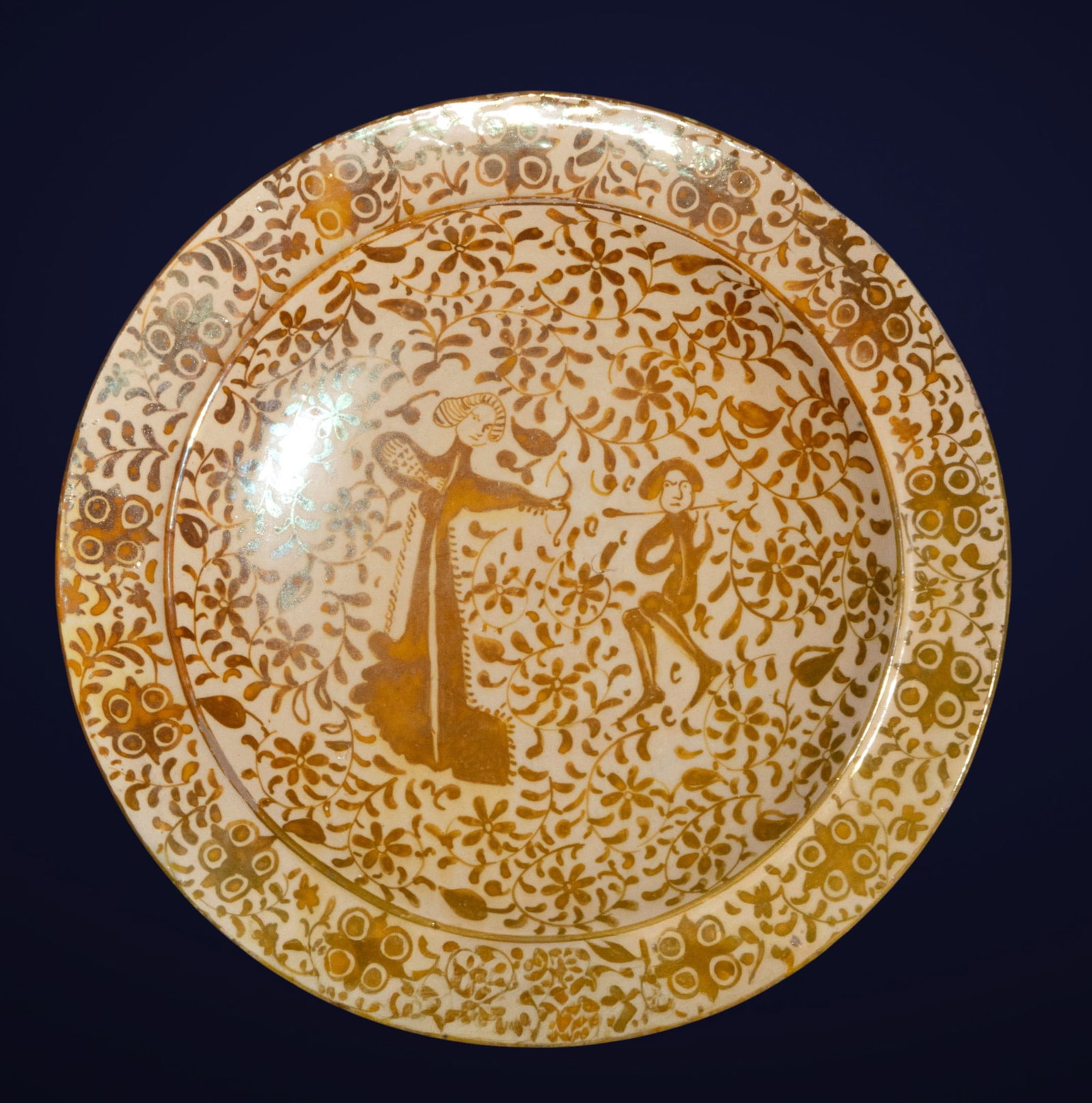 Metallic lusterware plate. Possibly from Paterna, Valencia. Hispano-Arabic tradition. 19th century (1 of 2)