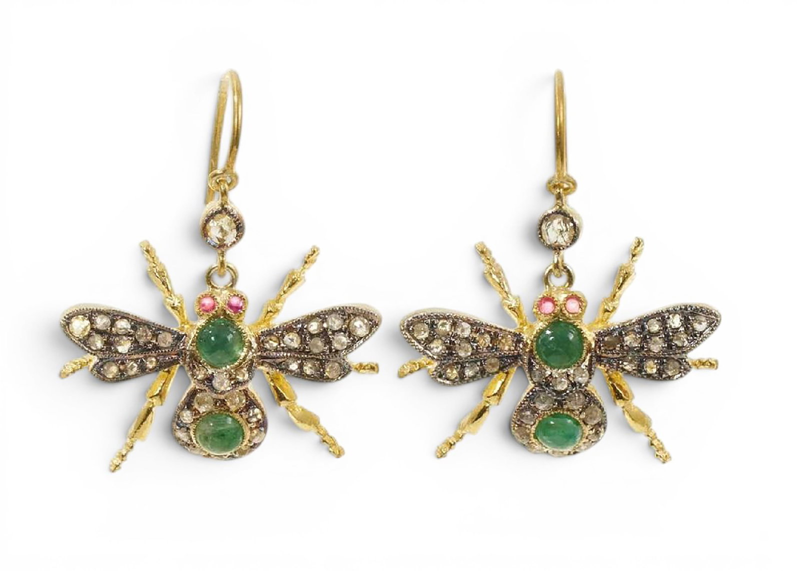 Pair of bee-shaped earrings in silver gilt with rose-cut diamonds, emeralds and spinels: Partially gilded 925 sterling silver, rose-cut diamonds, emeralds, and spinels. A refined pair of bee-shaped earrings adorned with rose-cut diamonds totaling approximately 0.35 ct, four emeralds of ap