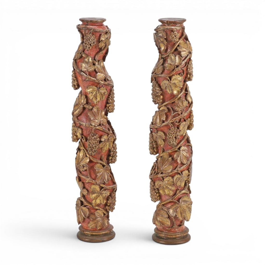 Magnificent pair of Antique 17th C Italian Baroque Polychromed Columns: Carved, painted and gilt wood. Height 107 cm. Pair of Baroque columns carved in wood, decorated with spiralling vine branches, richly detailed grape clusters and broad vine leaves highlighted with gil