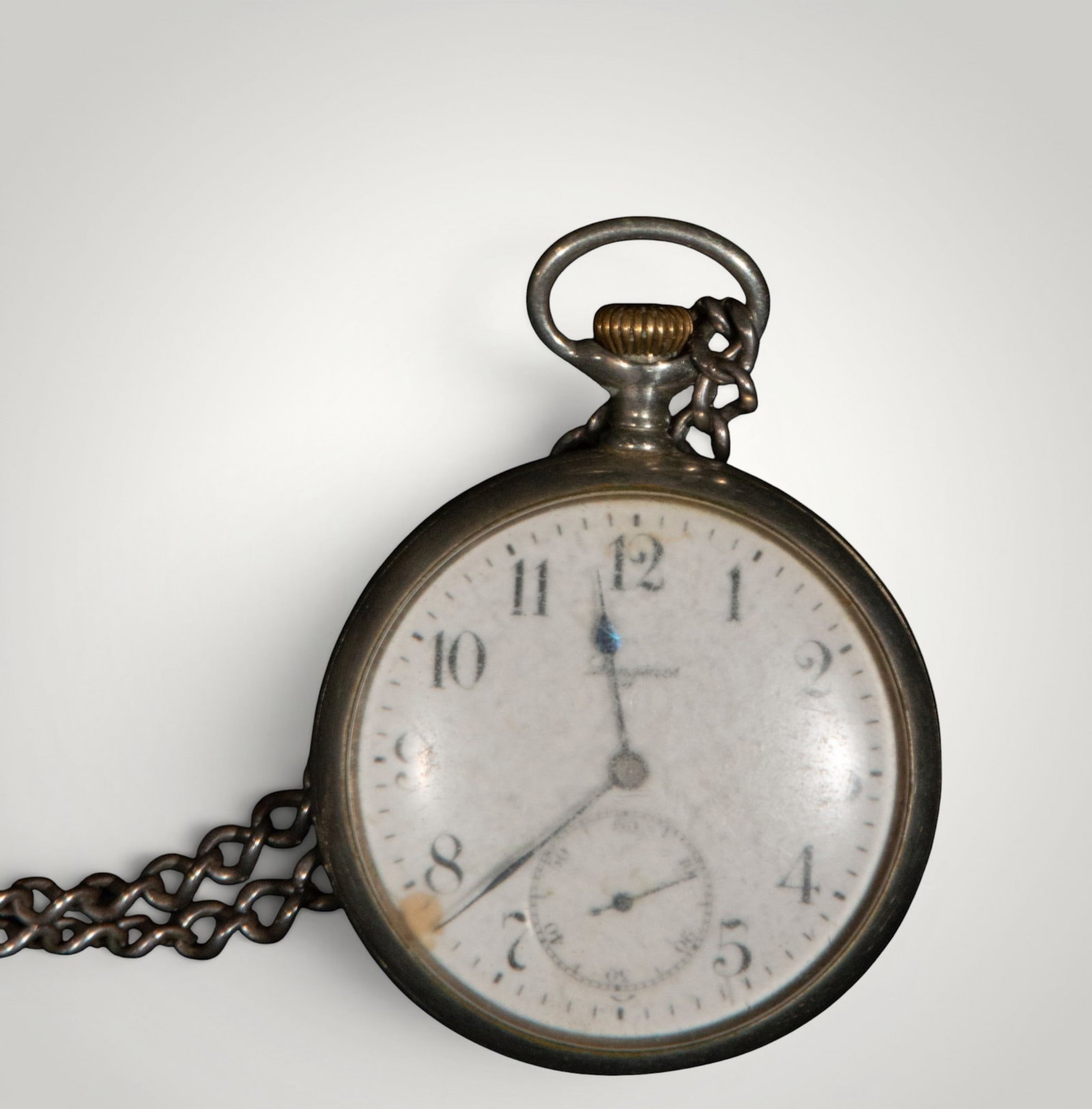 Longines pocket watch. Swiss school. 20th century: Silver, enamel, and mechanical movement. Measures 6 x 5 cm. Pocket watch with a circular case, white enamel dial, Arabic numerals, perimeter minute track, and small subsidiary seconds at six o'clock. 