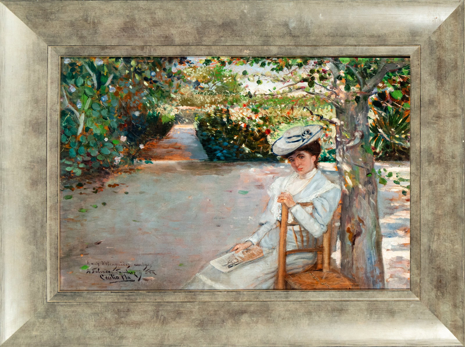 Lady in a Garden. Signed. Spanish School. 19th Century: Oil on panel. Dimensions without frame: 30 x 44 cm. Dimensions with frame: 43 x 57 cm. An elegantly dressed young woman rests by a tree in a sunlit garden, holding a fan or notebook. The vibrant brush