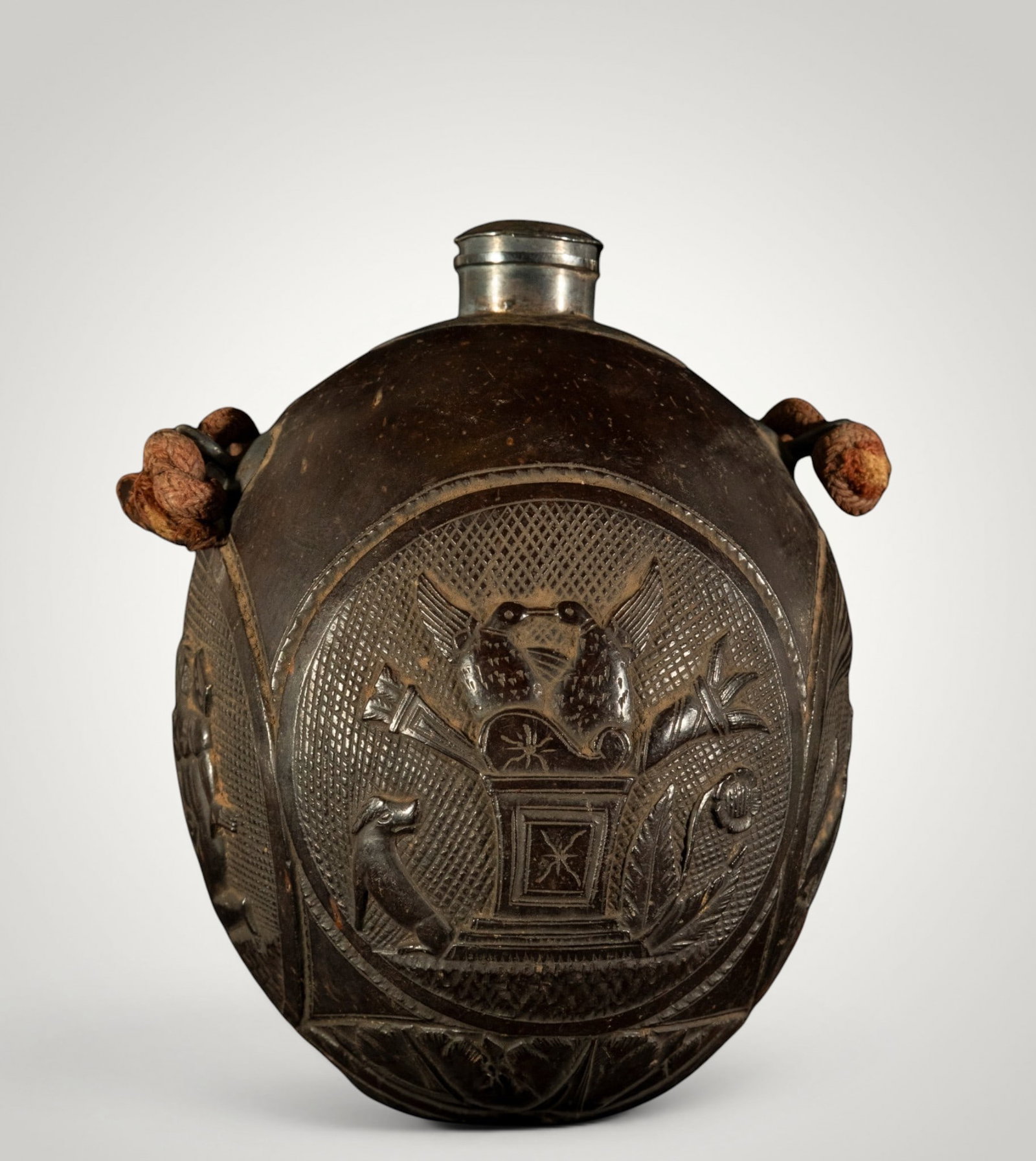 RARE 18TH CENTURY COLONIAL POWDER BOX FROM NEW GRANADA IN COCONUT AND SILVER: GOOD CONDITION, SILVER MOUTHPIECE AND COCONUT SEED BODY, 16 X 10 CM. Provenance: private Catalan collection.