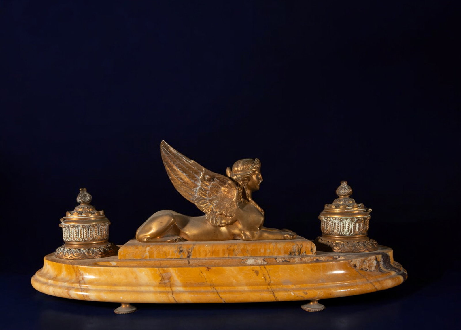 19th-Century Marble and Bronze Inkwell with Reclining Sphinx: Marble and bronze. Dimensions: 19 cm x 45 cm x 24 cm