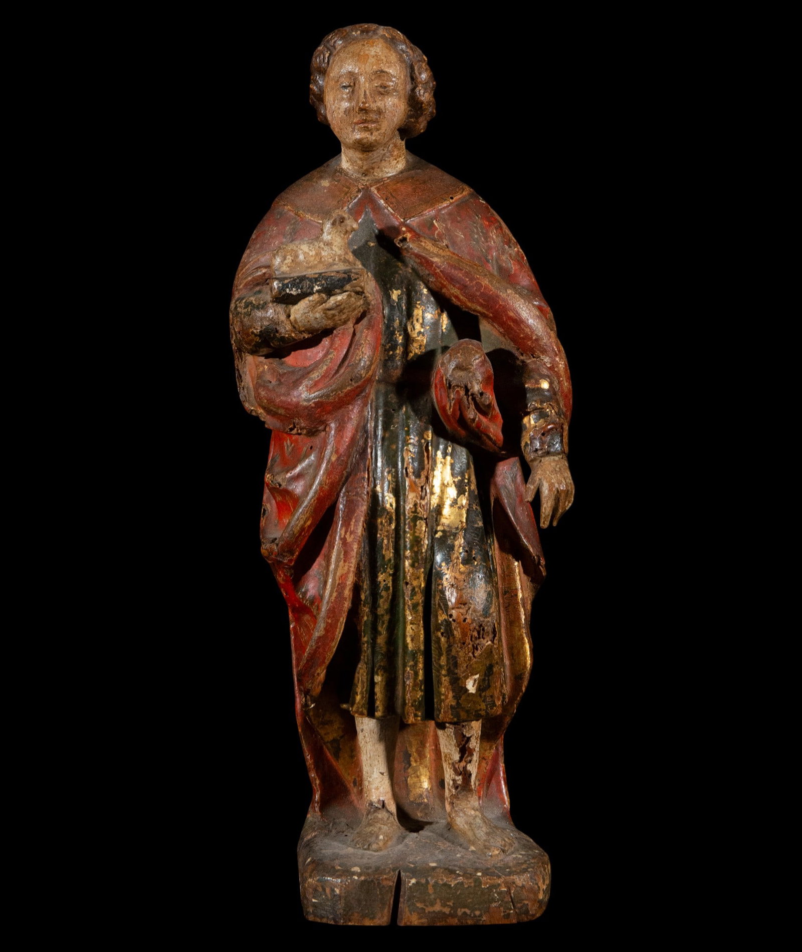 Important Gothic Saint John the Evangelist from Mechelen, Belgium, 15th century: Gothic Saint John the Evangelist, carved in polychrome wood with a wealth of detail. The figure shows the saint carrying the chalice, symbol of his gospel. The folds of the tunic and the cloak stand o