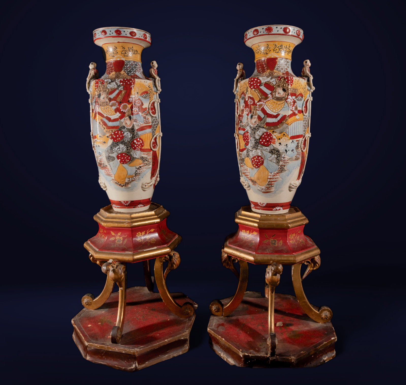 Pair of Large Japanese Satsuma Vases late 19th century: With lacquered and gilded wood bases. Measurements only vases: 63 x 23 x 28 cm, measurements with bases: 120 x 47 x 47 cm