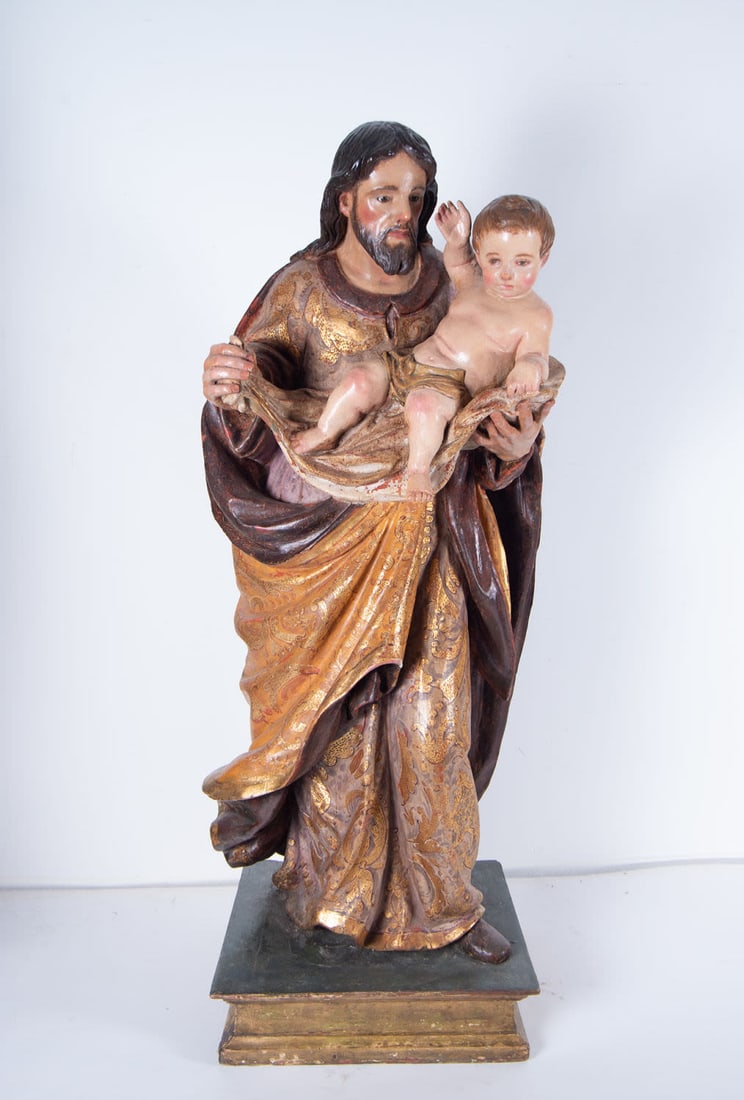 Saint Joseph with Child in Arms, Sevillian school of Pedro Roldán from the end of the 17th century: Carving in polychrome wood, measurements: 107 x 41 x 31 cm