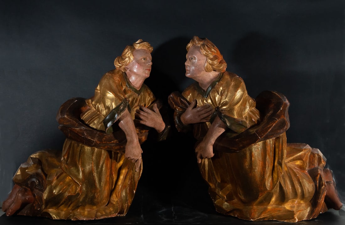 Magnificent Pair of Guardian Angels from Altar, Germany, possibly Cologne, 17th century: In carved, gilt and polychrome wood, each one measures: 70 x 68 x 17 cm. Provenance: Important private collection.