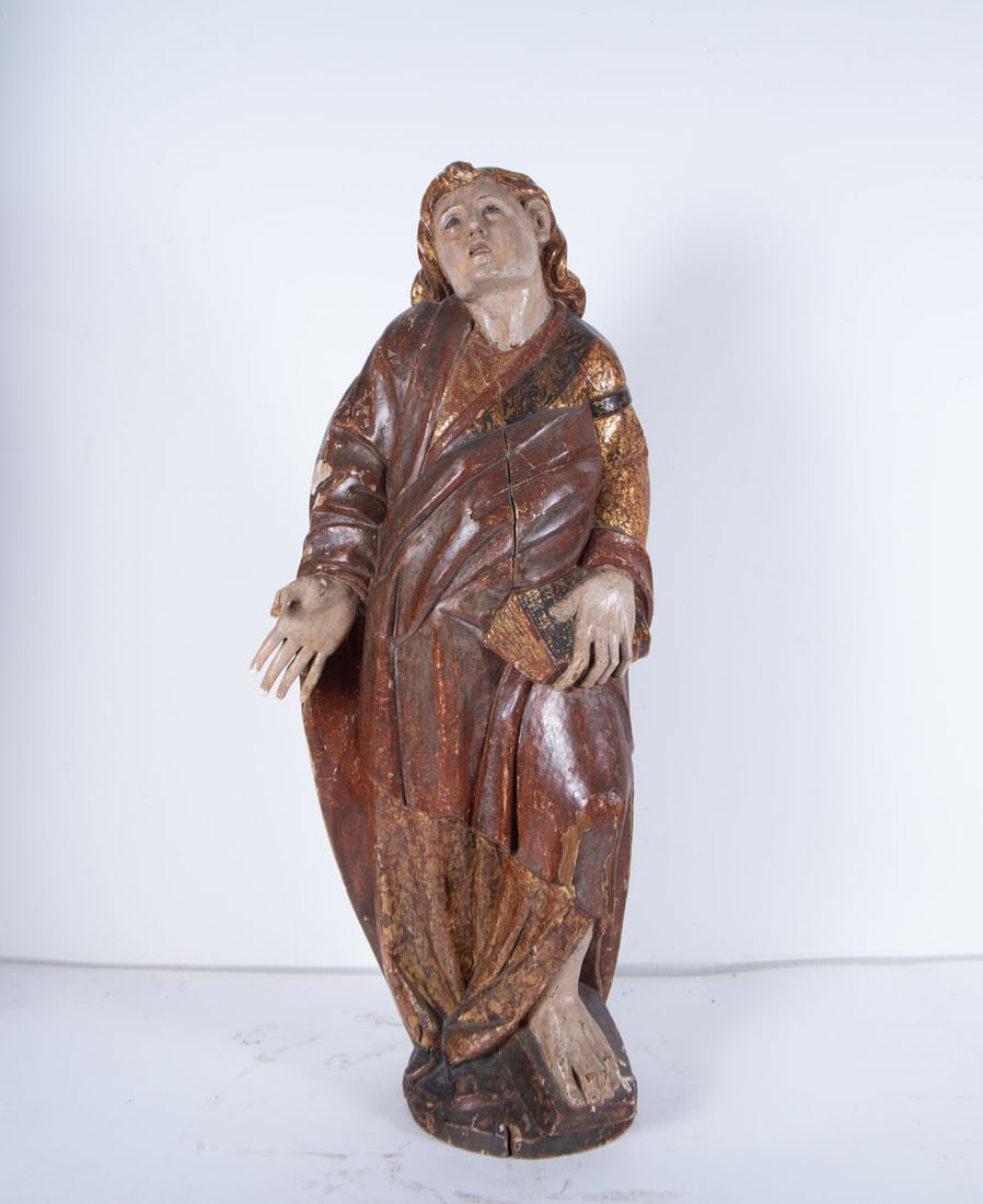 Saint John the Evangelist, Castilian school of the 16th century: Carving in polychrome wood, forming part of an element of Calvary, measurements: 94 x 38 x 28 cm