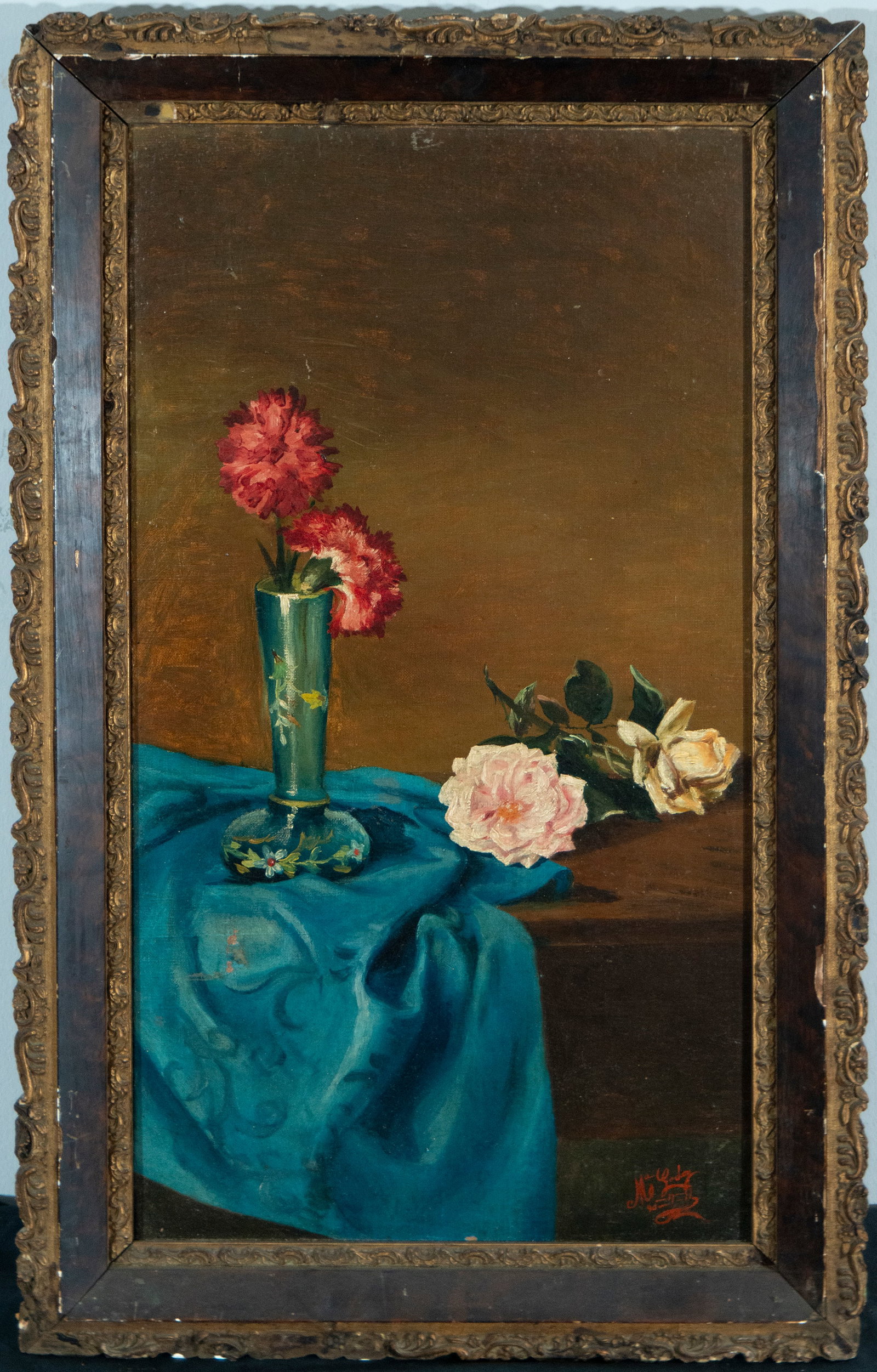 Vase on canvas. Signed. Spanish School. 20th century: Oil on canvas. Dimensions: 62 x 33.5 cm. A vase decorated with red flowers is placed on a vibrantly saturated blue canvas, while other roses in pink and cream tones rest on the adjacent surface. The n